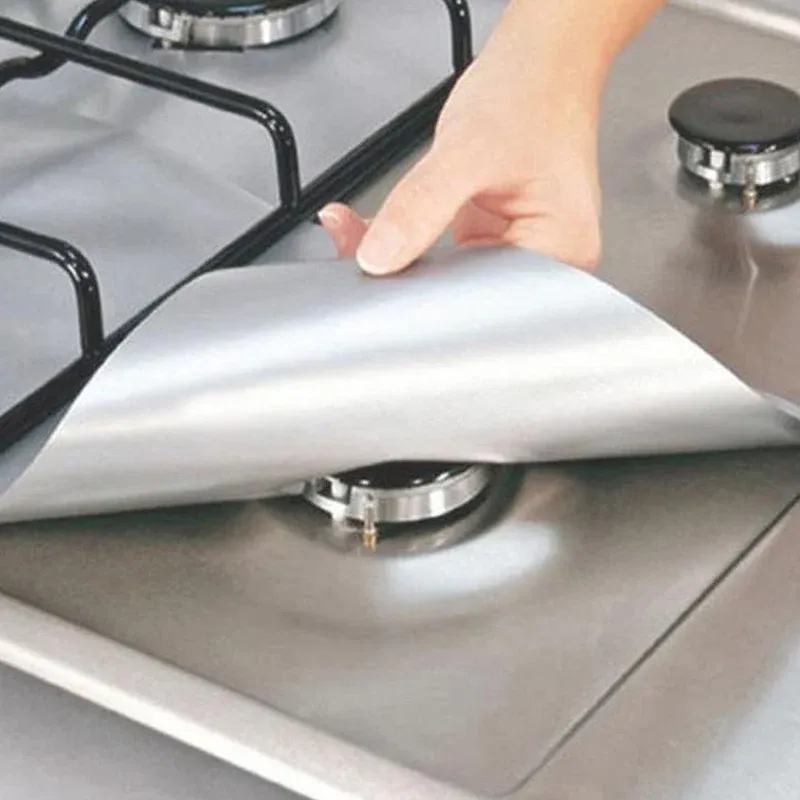 Non-stick burner liner collecting cooking spills